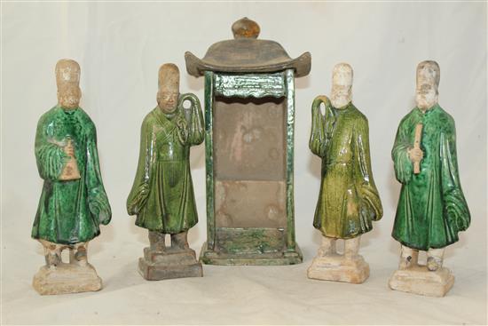 Four pottery tomb figures and a similar model of a shrine, Tang dynasty, 20.5cm and 26.5cm